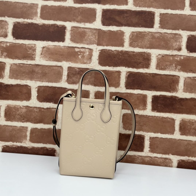 G*u*i top handle bags